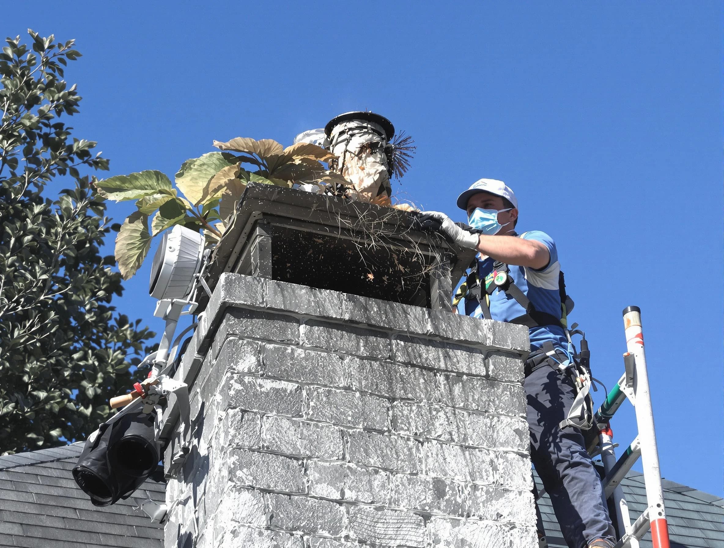 Montgomery Chimney Sweep specialist performing chimney cleaning in Montgomery, NJ